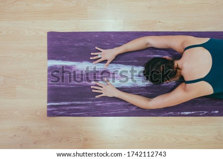 Similar – Image, Stock Photo Yoga girls doing Anahatasana pose. Cenital Plane