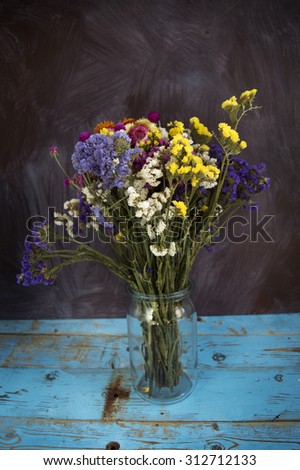 Bucket of dry flowers