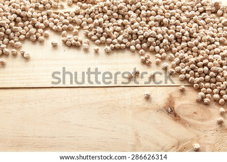 Chickpeas seen from above pouch of jute illuminated with natural light