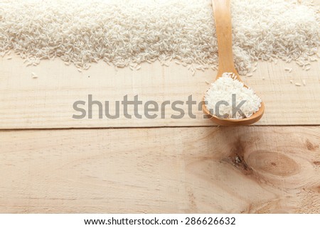 Rice grains seen from above pouch of jute illuminated with natural light