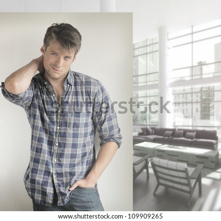 Natural portrait of a good looking young man in casual clothes in elegant bright modern interior