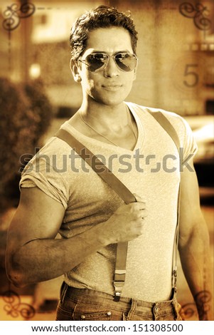 Stylized retro portrait in sepia tones  of a classic tough guy with vintage vignette framing and film texture