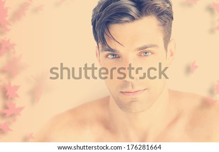 Stylized soft portrait of a handsome young man in vintage tones with abstract elements and copy space