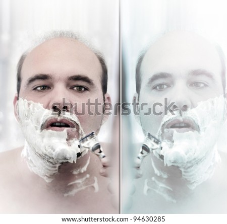 Portrait of a balding man shaving with mirror reflection