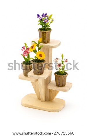Isolated of Wooden Stand with Clay Flowers on Wooden Stand.
