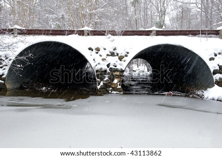 Snow covered storm water drainage tunnel in Richmond, Virginia during the winter storm in December 2009.
