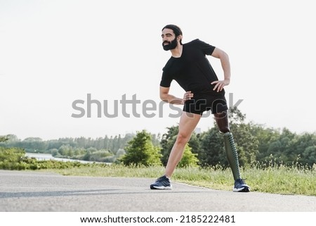 Similar – Image, Stock Photo Disabled man athlete stretching with leg prosthesis.