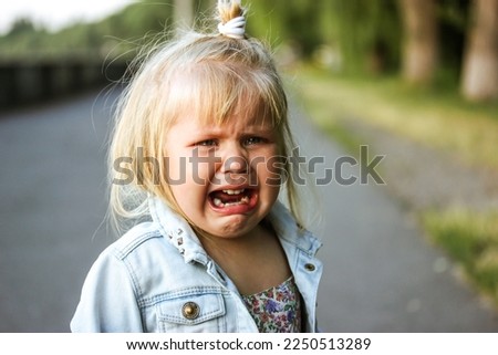 Similar – Image, Stock Photo Little girl is crying.