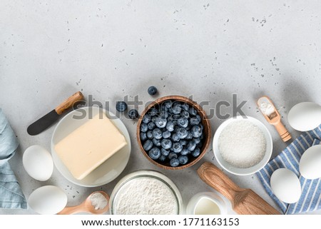 Similar – Foto Bild Blaubeerkuchen und Zutaten. Herstellung von Blaubeerkuchen mit Gitterkruste