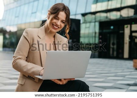 Similar – Image, Stock Photo proud blonde fashion beauty model woman, with red mouth and black fabric, cloth with hair electrostatic charged, sticking to cape, against black background