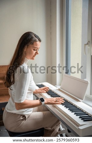 Similar – Image, Stock Photo Woman with modern synthesizer at home