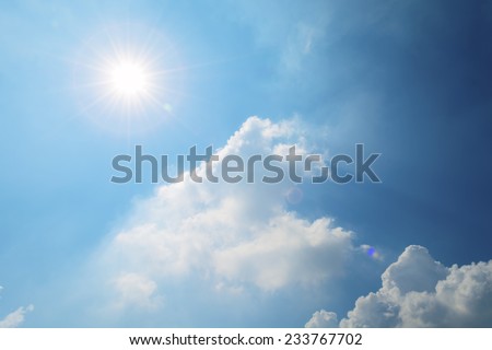 Sun flare on blue sky background