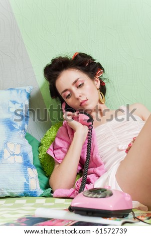 beauty girl pink phone call on green wall background