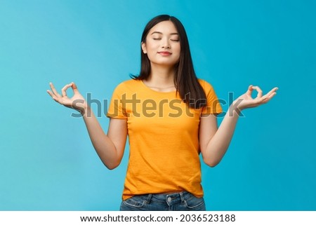 Similar – Image, Stock Photo Calm Asian female traveler standing on suspension bridge over river
