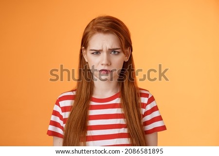 Similar – Image, Stock Photo Moody portrait in orange tones of a white woman