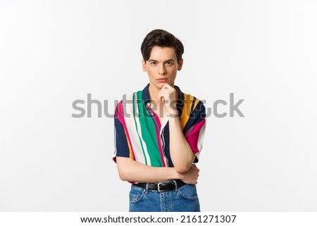 Similar – Image, Stock Photo Stylish androgynous man standing in darkness