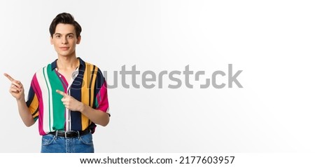 Similar – Image, Stock Photo Stylish androgynous man standing in darkness