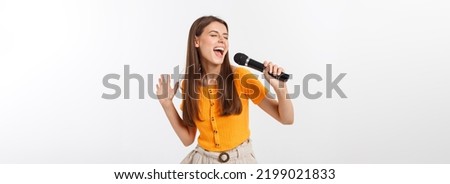 Image, Stock Photo Young woman singing with a microphone