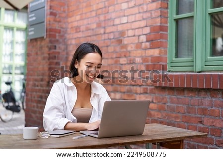 Similar – Image, Stock Photo Young woman doing homework on sofa