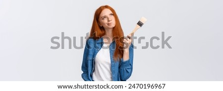 Similar – Image, Stock Photo a girl paints something in the sand with her finger on a beach