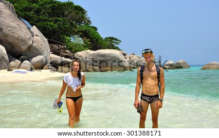KOH NANGYUAN, THAILAND -MARCH 12: Europe Lady tourist facing to Amazing View point in Nangyuan Island,12 March, 2015.
