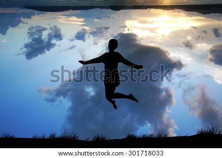 Freedom and Enjoyment concept - Happy lady jumping ,dancing with beautiful Earth perspective.