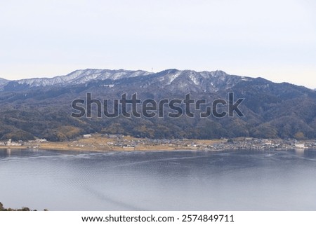 Similar – Image, Stock Photo Calm sea near hill under cloudy sky in foggy weather