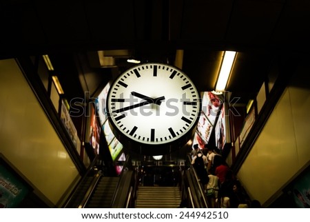 plain clock in transportation zone. to remind people go to destination hurry up.
