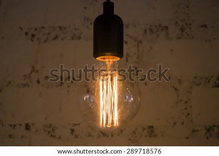 Electric light lamp Sparkling in the dark room.\
Electric movement\
Vintage light bulb