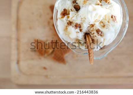 white ice cream with waffles and nuts