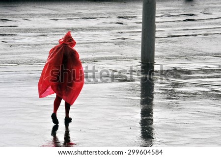 Woman walking in the rain at Budapest.Rainy day.