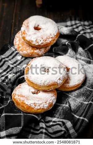 Similar – Image, Stock Photo Person pouring sugar powder with tea strainer above cake