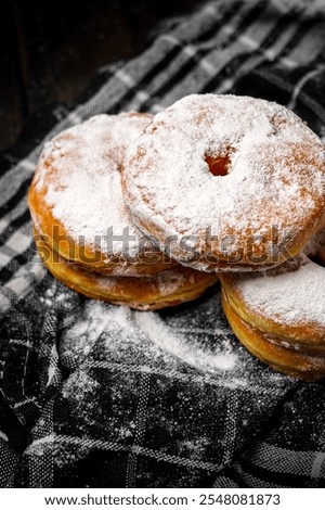 Similar – Image, Stock Photo Person pouring sugar powder with tea strainer above cake