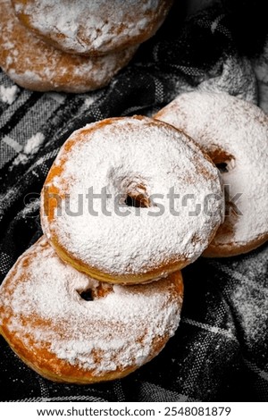 Similar – Image, Stock Photo Person pouring sugar powder with tea strainer above cake