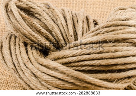 roll of rope on sack cloth,burlap