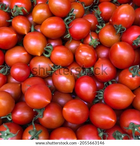 Macro photo cherry tomato. Stock photo vegetable red cherry tomatoes background
