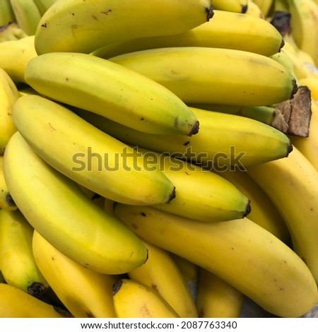 Macro photo spell bananas fruit. Stock photo yellow banana fruit background