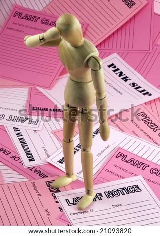 Mannequin surrounded by pink slips in dejected pose