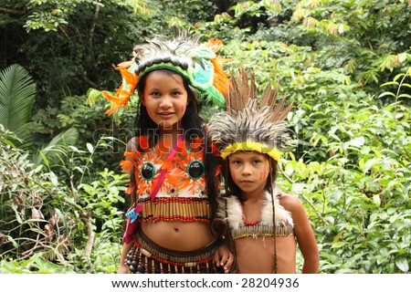 BOCA DE VALERIA: MARCH 11: Two young Indian girls are encountered in the rain forest on the Amazon River on March  11, 2009, in Brazil