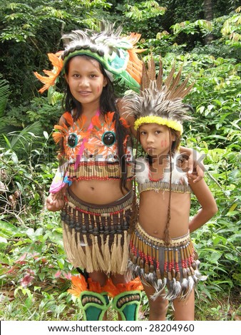 BOCA DE VALERIA: MARCH 11: Two young Indian girls are encountered in the rain forest on the Amazon River on March  11, 2009, in Brazil