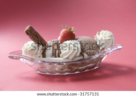 Please see all my other food images as well. Luxurious Banana Split, with ice cream, vanilla cream, chocolate flake, sauce and a strawberry on top. PATH included for easy cut out.