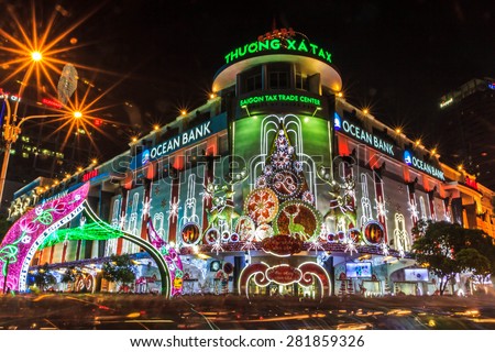 HO CHI MINH CITY, VIETNAM - DEC 25: Saigon Tax Trade Center by night on DEC 25, 2013 in Ho Chi Minh City. Tax Center is the market where you can buy digital