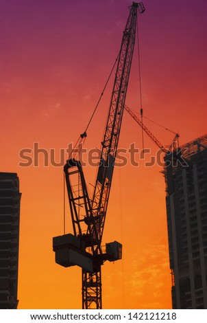 Construction site in Dubai with red sky