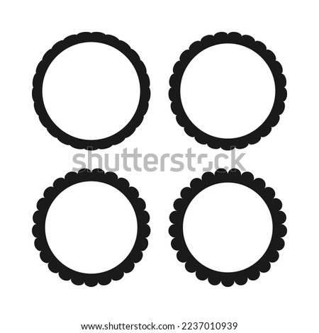 Scallop edge hollow circle stroke shapes. A group of 4 round symbols with scalloped outside edges. Isolated on a white background.