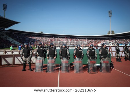 Belgrade, Serbia - October 23, 2010: Riot police protect the football field during a derby between Red Star and Partizan.