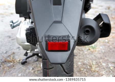 Similar – Image, Stock Photo Big black rear fender of an american road cruiser of the fifties in front of the window of an old house at the Golden Oldies in Wettenberg Krofdorf-Gleiberg near Giessen in Hesse, Germany.