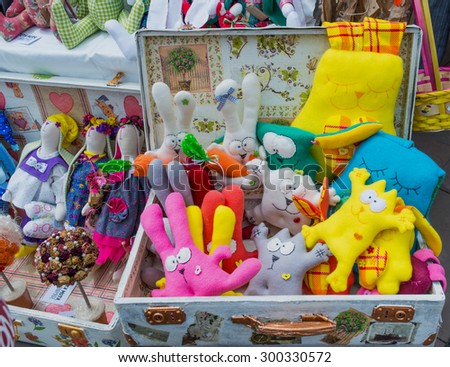 CHERNIVTSI, UKRAINE - JUL 11, 2015: Petrovsky fairs in Chernivtsi.  Selling funny handmade toys. The photo was taken during a visit to the annual fair in Chernivtsi.