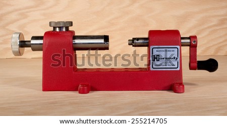 RIVER FALLS,WISCONSIN-FEBRUARY 23,2015:A Hornady metalic cartridge case trimmer. This tool is used to trim cases when reloading metallic cartridges.