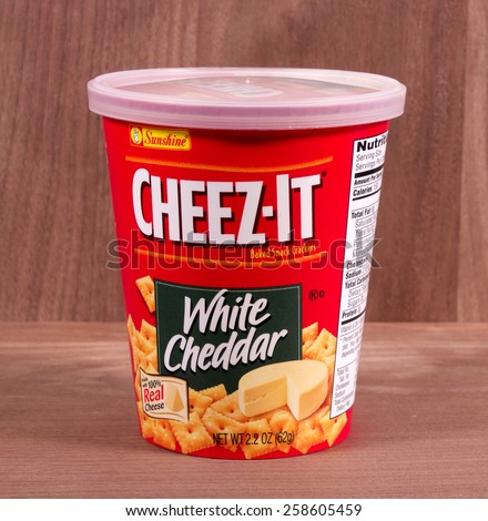 RIVER FALLS,WISCONSIN-MARCH 06,2015: A container of Cheez-It White Cheddar snack crackers. These crackers are a product of Sunshine Biscuits Incorporated.