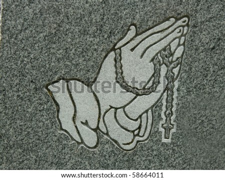 Praying Hands And Rosary Carved Into Granite Stock Photo 58664011 ...